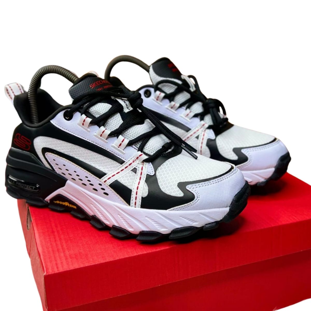 Comprar Zapatillas Skechers Max Protect Goodyear para Hombre Si estás buscando Comprar zapatillas Skechers Max Protect Goodyear para hombre, has llegado al lugar correcto. En Onlineshoppingcenterg, te ofrecemos toda la información que necesitas para tomar la mejor decisión de compra. Estas zapatillas son ideales para quienes buscan comodidad, durabilidad y un diseño moderno. A continuación, te contamos todo lo que debes saber sobre las zapatillas Skechers Max Protect Goodyear.  ¿Por qué elegir las zapatillas Skechers Max Protect Goodyear? Las zapatillas Skechers Max Protect Goodyear están diseñadas para hombres que buscan un calzado resistente y cómodo. Con tecnología Goodyear, estas zapatillas ofrecen una suela duradera que se adapta a todo tipo de superficies. Además, su diseño ergonómico las hace perfectas para uso diario, deportivo o casual.    Características principales Materiales de alta calidad: Las zapatillas Skechers Max Protect Goodyear están hechas con materiales resistentes que garantizan larga duración.  Suela antideslizante: La suela con tecnología Goodyear proporciona un excelente agarre en cualquier superficie.  Amortiguación cómoda: Su diseño incluye una plantilla acolchada que ofrece máximo confort durante todo el día.  Diseño moderno: Disponibles en colores como negro, azul, blanco, gris y rojo, estas zapatillas combinan con cualquier estilo.  Colores disponibles Las zapatillas Skechers Max Protect Goodyear vienen en una variedad de colores para que elijas el que más te guste:  Negras: Ideales para un look clásico y elegante.  Azules: Perfectas para un estilo fresco y moderno.  Blancas: Combinan con todo y son ideales para el verano.  Grises: Un tono neutro que se adapta a cualquier ocasión.  Rojas: Para quienes buscan un toque de color en su calzado.  Negras y blancas: Un diseño atemporal que nunca pasa de moda.  Beneficios de las zapatillas Skechers Max Protect Goodyear Estas zapatillas no solo son estéticamente atractivas, sino que también ofrecen múltiples beneficios:  Durabilidad: Gracias a la tecnología Goodyear, las suelas son resistentes al desgaste, lo que las hace perfectas para uso intensivo.  Confort: La amortiguación avanzada reduce la fatiga en los pies, incluso después de horas de uso.  Versatilidad: Puedes usarlas para caminar, hacer deporte o simplemente para un look casual.  Estilo moderno: Su diseño combina funcionalidad con tendencias actuales, lo que las convierte en una opción popular entre hombres de todas las edades.  ¿Dónde comprar zapatillas Skechers Max Protect Goodyear? En Onlineshoppingcenterg, encontrarás las zapatillas Skechers Max Protect Goodyear al mejor precio. Ofrecemos ofertas exclusivas y envíos rápidos para que recibas tu calzado en poco tiempo. Además, contamos con una garantía de satisfacción para que compres con total confianza.  Precios y ofertas El precio de las zapatillas Skechers Max Protect Goodyear varía según el color y la talla. En nuestra tienda, encontrarás opciones económicas sin sacrificar la calidad. ¡Aprovecha nuestras promociones de 2025 y consigue tus zapatillas al mejor precio!  ¿Por qué comprar en Onlineshoppingcenterg? Productos auténticos: Garantizamos que todas nuestras zapatillas Skechers Max Protect Goodyear son de alta calidad.  Atención al cliente: Nuestro equipo está disponible para resolver cualquier duda antes y después de tu compra.  Envíos rápidos: Recibe tus zapatillas en la comodidad de tu hogar en tiempo récord.  Pagos seguros: Ofrecemos múltiples métodos de pago para que elijas el que más te convenga.  ¿Cómo elegir la talla correcta? Para asegurarte de que tus zapatillas Skechers Max Protect Goodyear te queden perfectas, sigue estos consejos:  Mide tu pie desde el talón hasta la punta del dedo más largo.  Consulta nuestra guía de tallas disponible en la página del producto.  Si tienes dudas, contáctanos y te ayudaremos a elegir la talla adecuada.  ¿Cómo cuidar tus zapatillas Skechers Max Protect Goodyear? Para mantener tus zapatillas Skechers Max Protect Goodyear en perfecto estado, sigue estos consejos:  Limpia la superficie con un paño húmedo y jabón suave.  Evita exponerlas a altas temperaturas o humedad extrema.  Guarda tus zapatillas en un lugar fresco y seco cuando no las uses.  Usa un protector de calzado para mantener su aspecto como nuevo.  Reseñas de clientes Nuestros clientes están encantados con sus zapatillas Skechers Max Protect Goodyear. Aquí algunas de sus opiniones:  "Son las zapatillas más cómodas que he usado. Las uso para caminar y hacer deporte, y nunca me han defraudado."  "El diseño es increíble y la calidad es excelente. Las recomiendo 100%."  "Compré las negras y blancas, y son perfectas para cualquier ocasión. Además, el envío fue super rápido."  Preguntas frecuentes ¿Son aptas para correr? Sí, las zapatillas Skechers Max Protect Goodyear son ideales para correr gracias a su suela antideslizante y su amortiguación cómoda.  ¿Tienen garantía? Sí, todas nuestras zapatillas cuentan con garantía de calidad. Si encuentras algún defecto, contáctanos y te ayudaremos.  ¿Hacen envíos internacionales? Sí, en Onlineshoppingcenterg realizamos envíos a todo el mundo. Consulta los costos y tiempos de entrega en nuestra página de envíos.  ¡Haz tu pedido hoy mismo! No esperes más para tener tus zapatillas Skechers Max Protect Goodyear. Visita Onlineshoppingcenterg, elige tu color y talla favoritos, y disfruta de la mejor calidad al mejor precio. ¡Tu comodidad y estilo están a solo un clic de distancia!